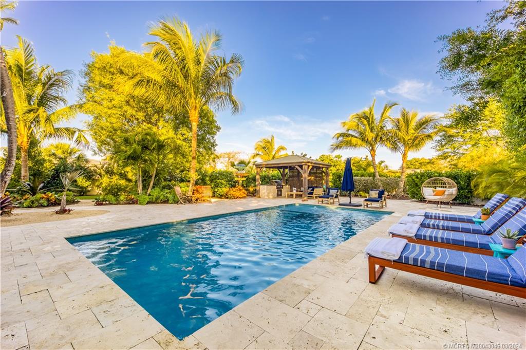 3713 Southeast Matanzas Street Stuart, FL 34996 - Photo 18 of 53 a view of outdoor space with seating area