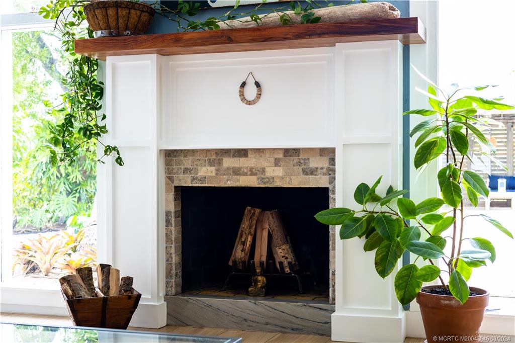 3713 Southeast Matanzas Street Stuart, FL 34996 - Photo 36 of 53 a potted plant sitting on the side of a building