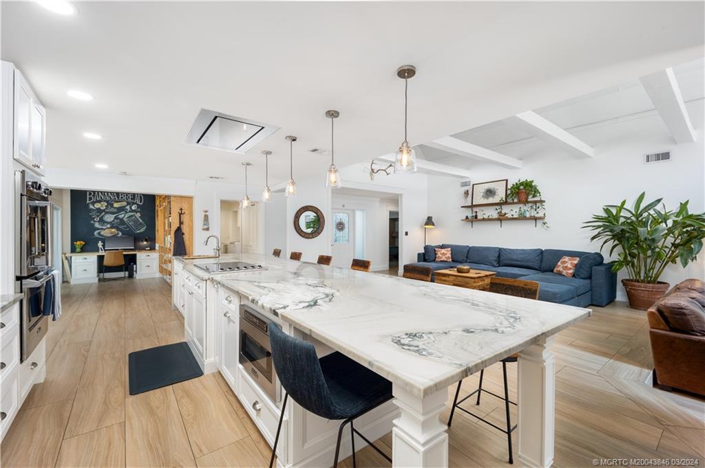 3713 Southeast Matanzas Street Stuart, FL 34996 - Photo 38 of 53 a view of a kitchen and dining room