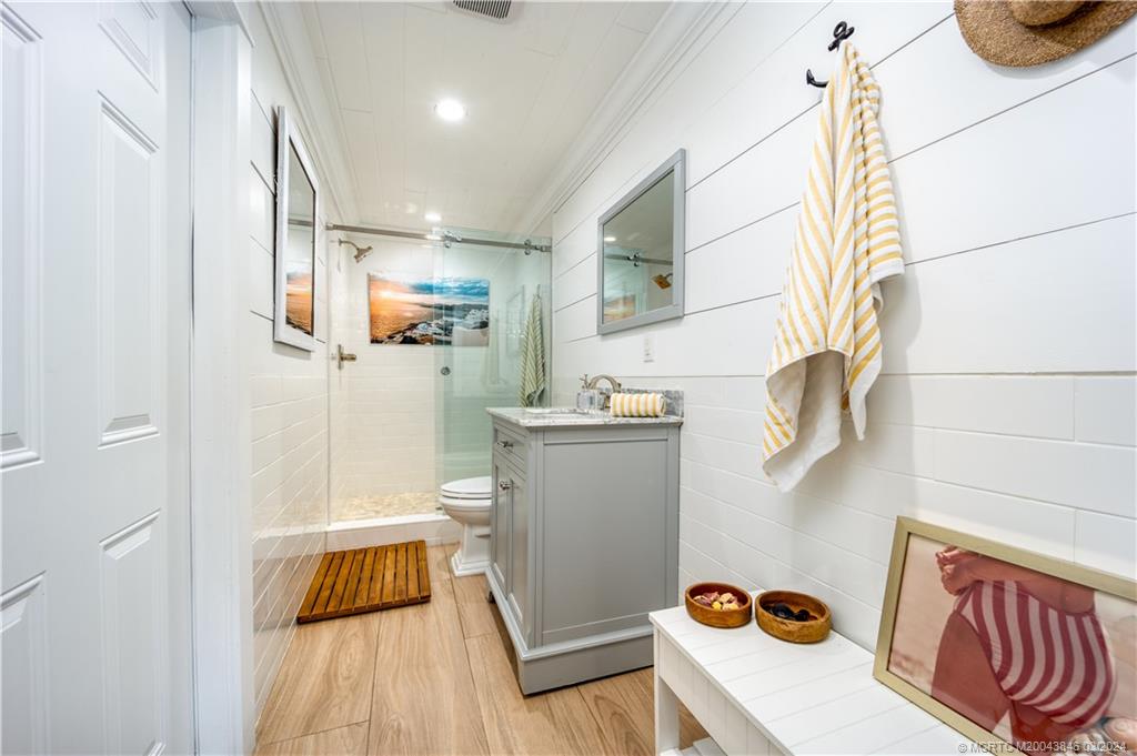 3713 Southeast Matanzas Street Stuart, FL 34996 - Photo 41 of 53 a kitchen with a refrigerator and a stove