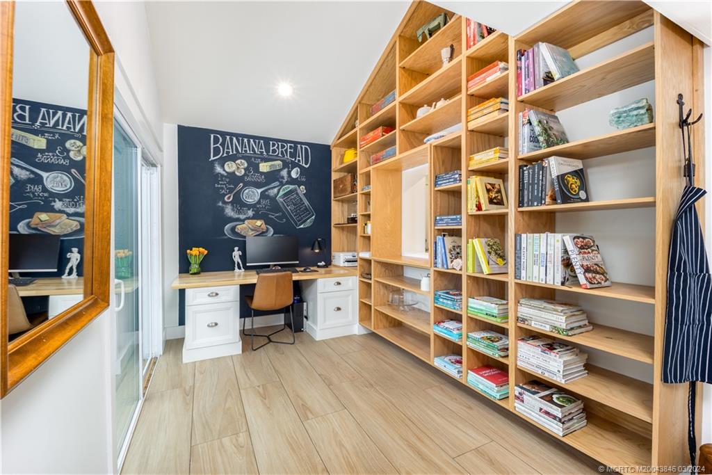 3713 Southeast Matanzas Street Stuart, FL 34996 - Photo 42 of 53 a room with toys and storage area