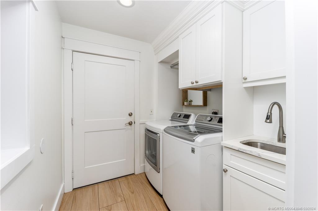 3713 Southeast Matanzas Street Stuart, FL 34996 - Photo 50 of 53 a kitchen with stainless steel appliances granite countertop a stove and a refrigerator