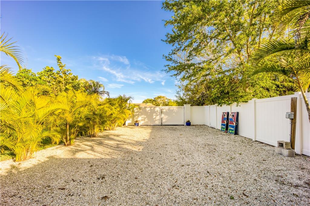 3713 Southeast Matanzas Street Stuart, FL 34996 - Photo 51 of 53 a view of a backyard of a house