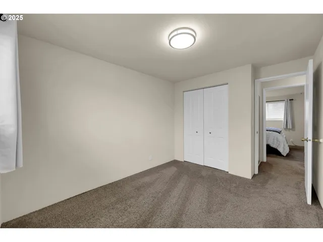 a view of a livingroom with wooden floor