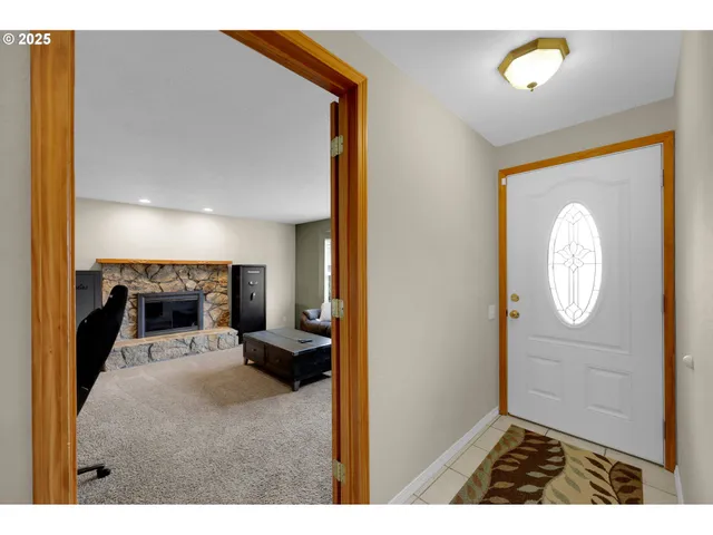 a view of a bedroom with a bed and furniture