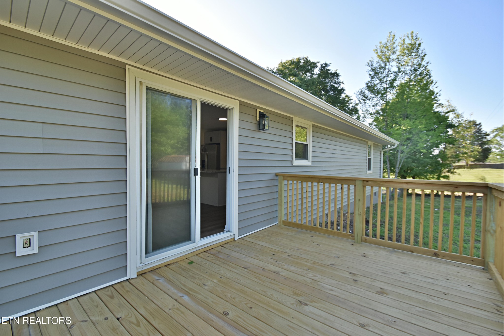 1119 Rudd Road Greenback, TN 37742 - Photo 20 of 28 a view of backyard with a deck