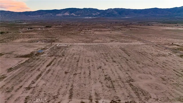 a view of an outdoor space with mountain view