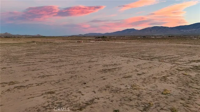 a view of an ocean and a mountain