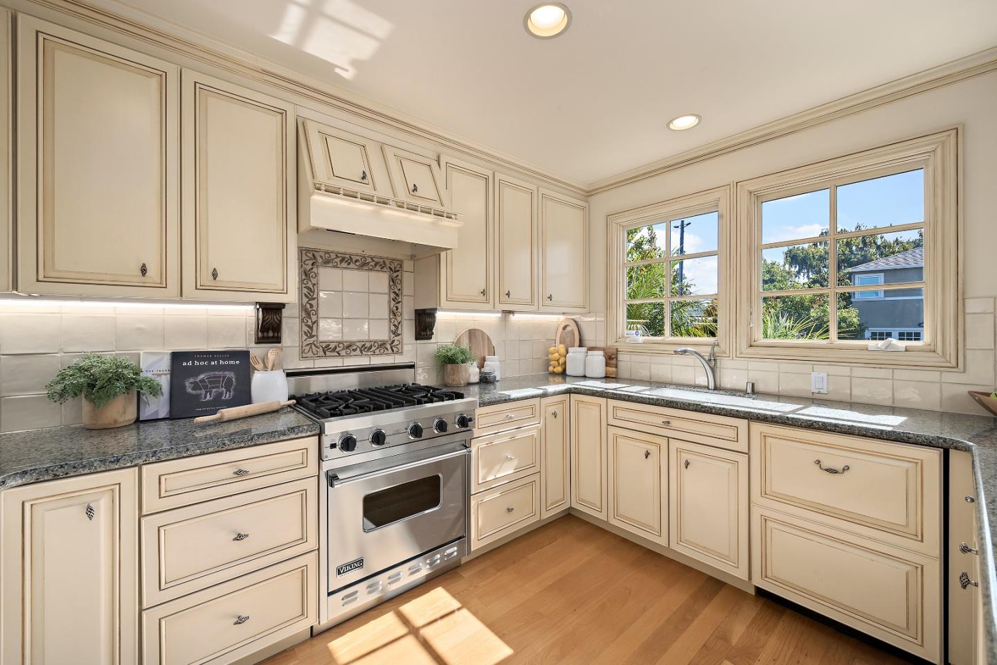 2012 Davis Drive Burlingame, CA 94010 - Photo 13 of 34 a kitchen with granite countertop white cabinets and white stainless steel appliances