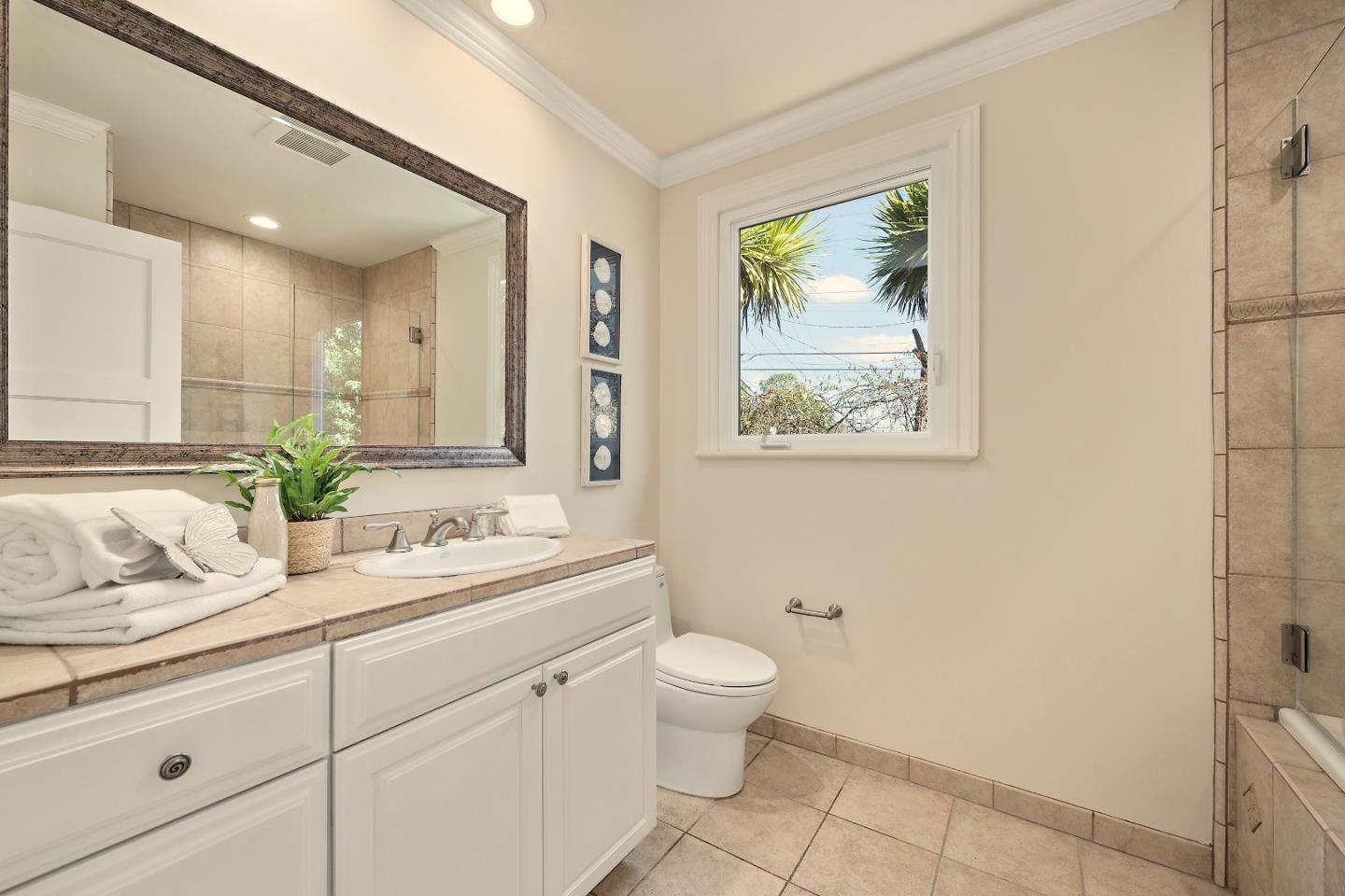 2012 Davis Drive Burlingame, CA 94010 - Photo 17 of 34 a bathroom with a granite countertop sink mirror and toilet