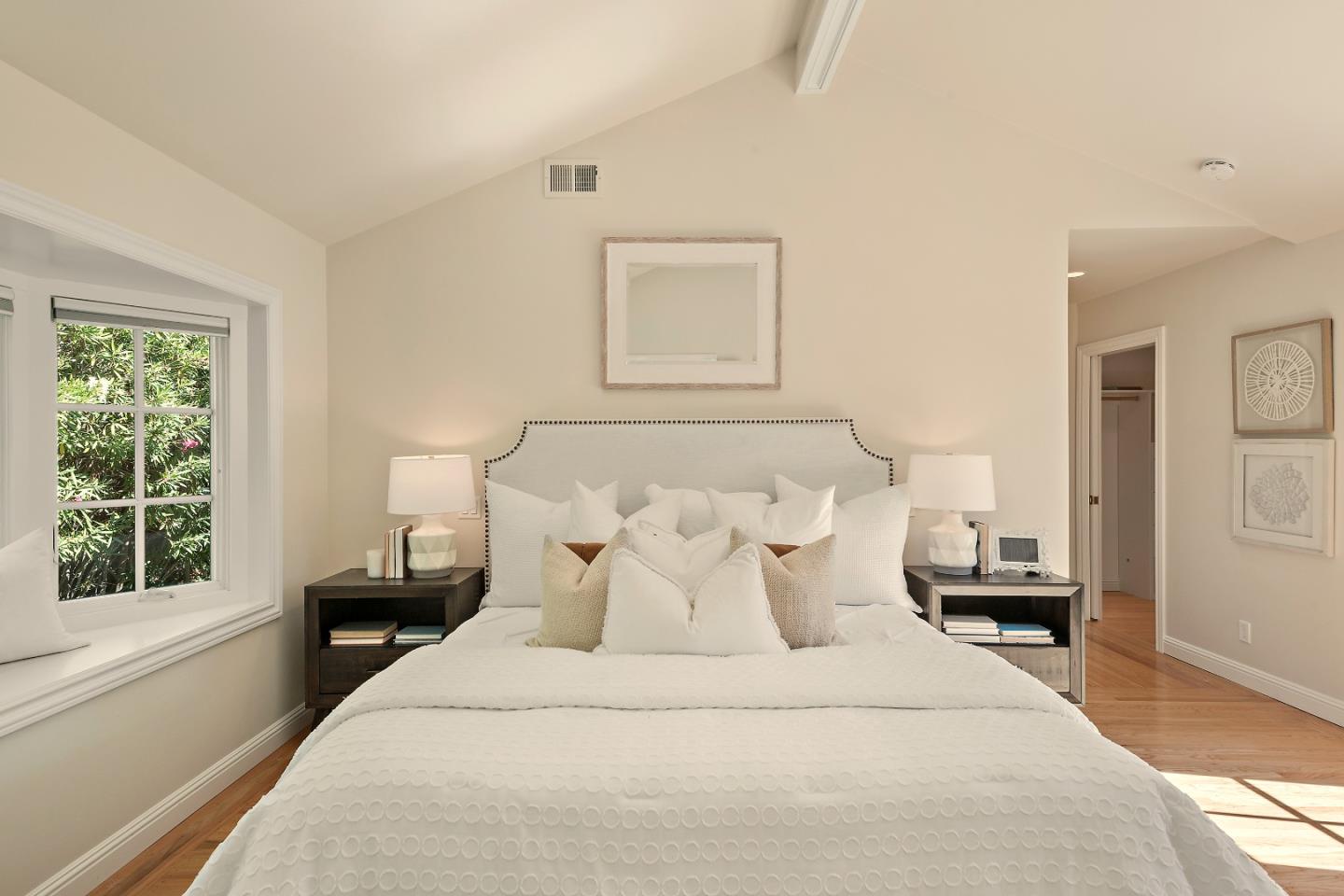 2012 Davis Drive Burlingame, CA 94010 - Photo 22 of 34 a bedroom with a bed and wooden floor