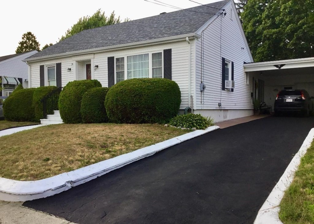 94 Winthrop Street Fall River, MA 02721 - Photo 2 of 29 a view of backyard of house and car parked