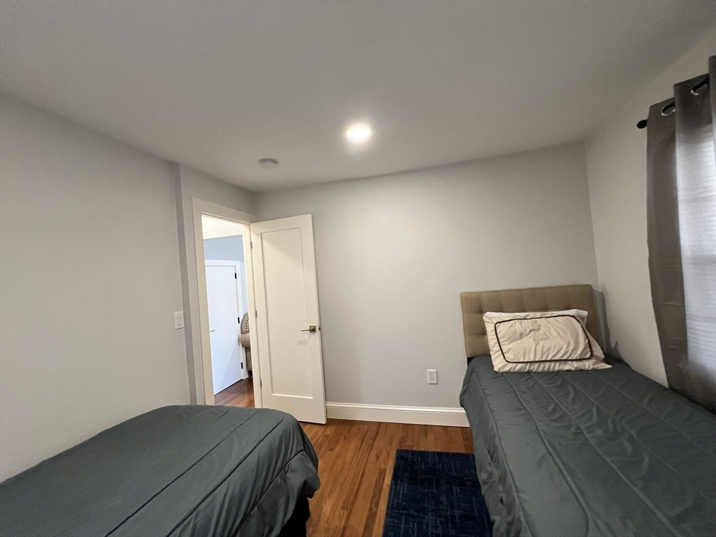 81 Stuart Street Gardner, MA 01440 - Photo 15 of 24 a view of room with window and wooden floor