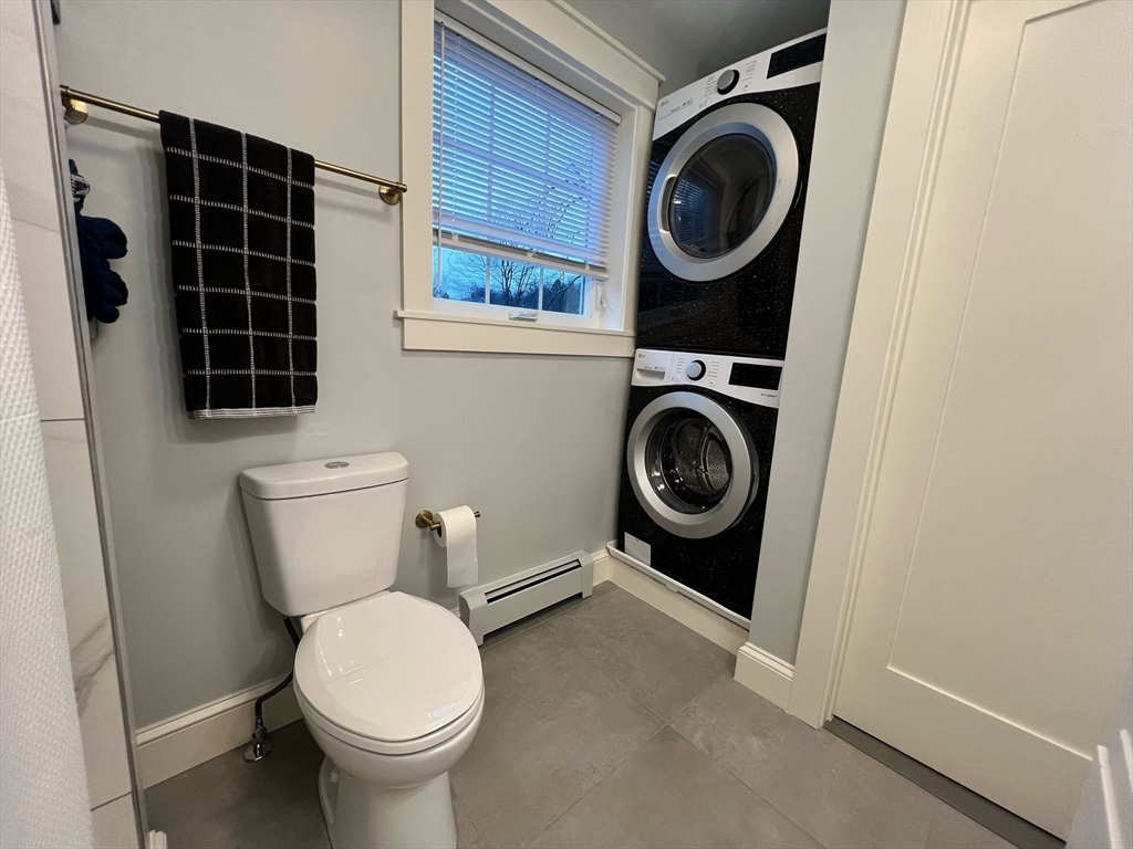 81 Stuart Street Gardner, MA 01440 - Photo 16 of 24 a bathroom with a toilet and a sink