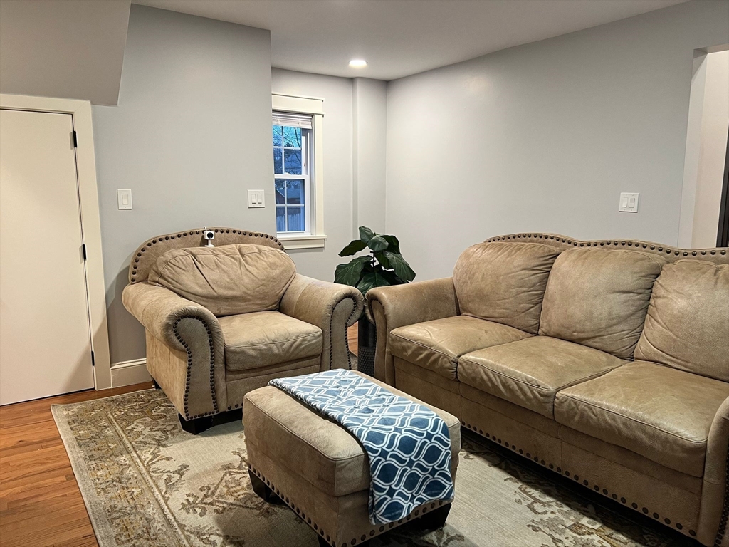 81 Stuart Street Gardner, MA 01440 - Photo 9 of 24 a living room with furniture and a couch