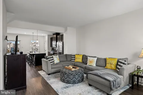 a living room with furniture and a couch