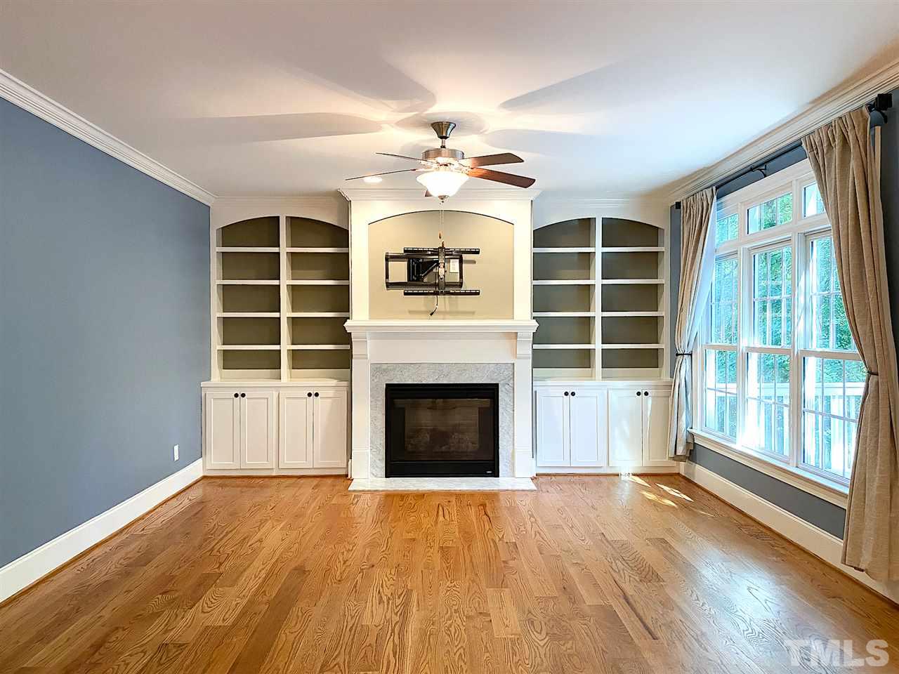 412 Thyme Place Raleigh, NC 27609 - Photo 5 of 26 Built-Ins | Fireplace | Natural Light