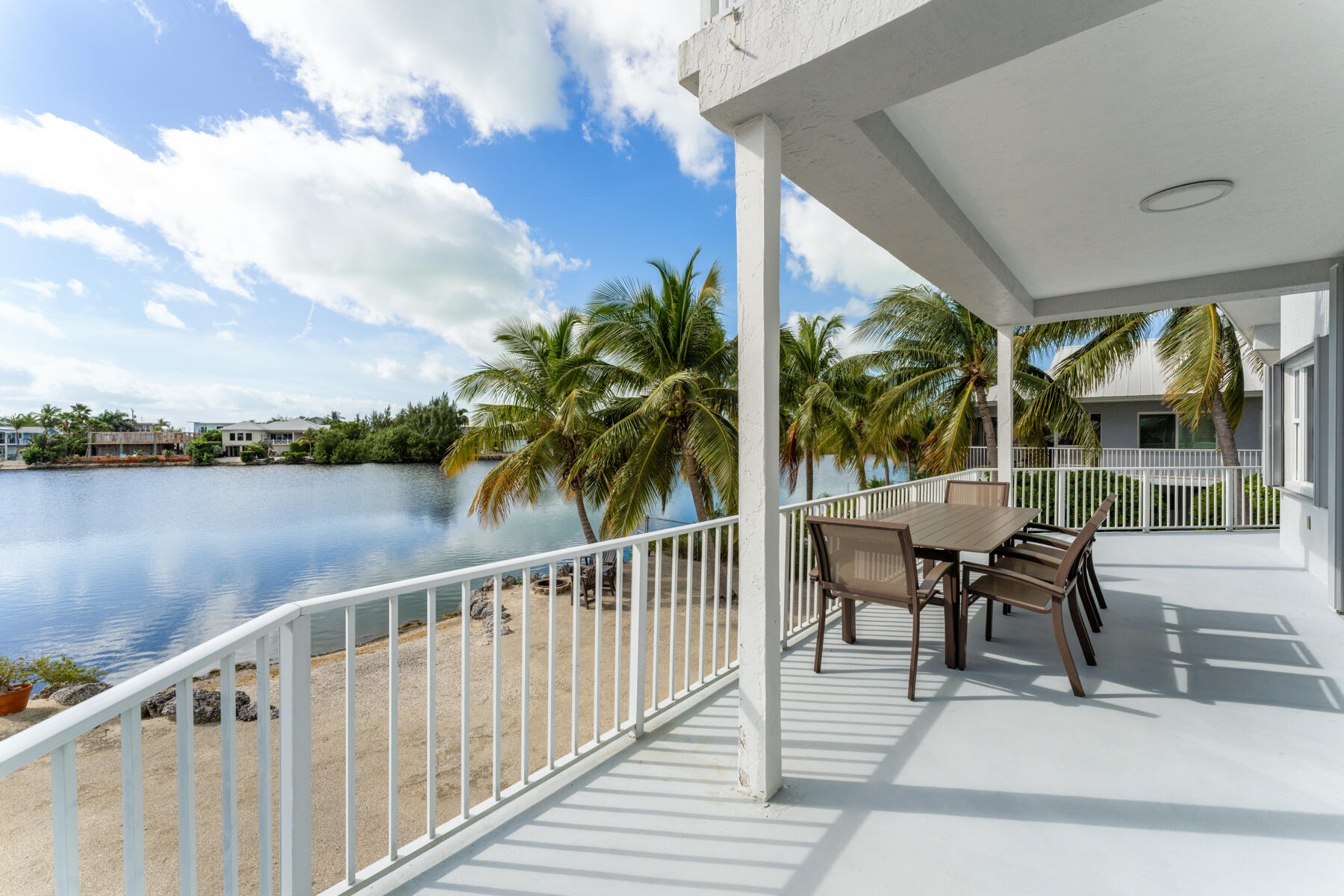 54 Mutiny Place Key Largo, FL 33037 - Photo 55 of 69 Dining area lake side