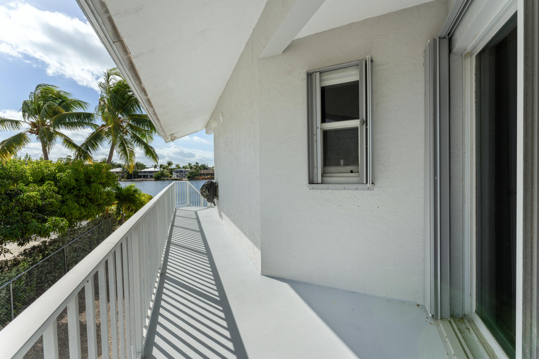 54 Mutiny Place Key Largo, FL 33037 - Photo 59 of 69 Porch access from guest bedroom