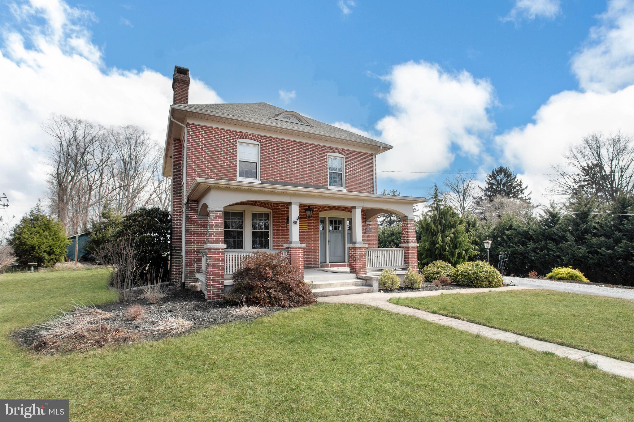 1501 Jacobs Mill Road Hanover, PA 17331 - Photo 1 of 39 a front view of a house with garden