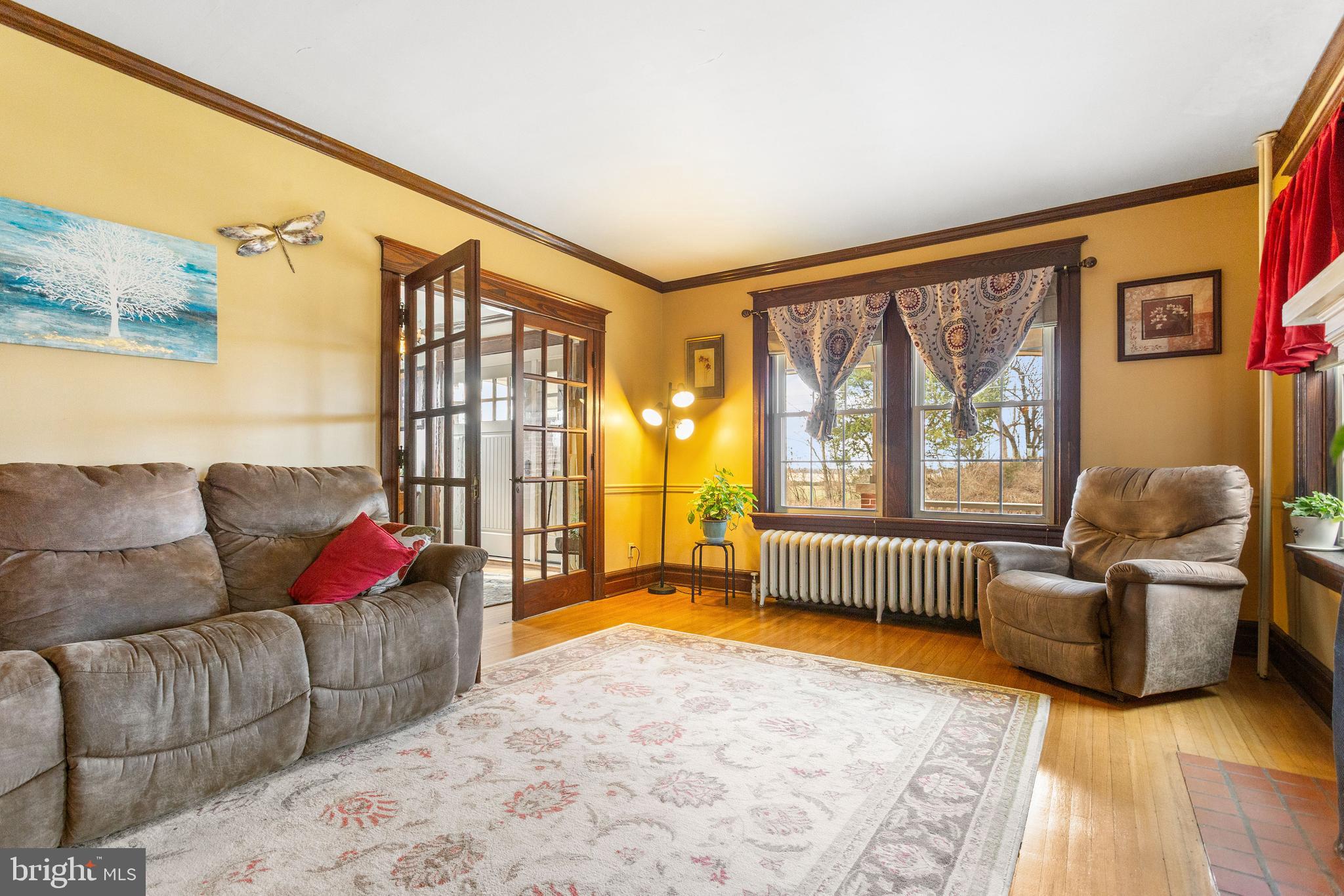 1501 Jacobs Mill Road Hanover, PA 17331 - Photo 13 of 39 a living room with furniture and a floor to ceiling window