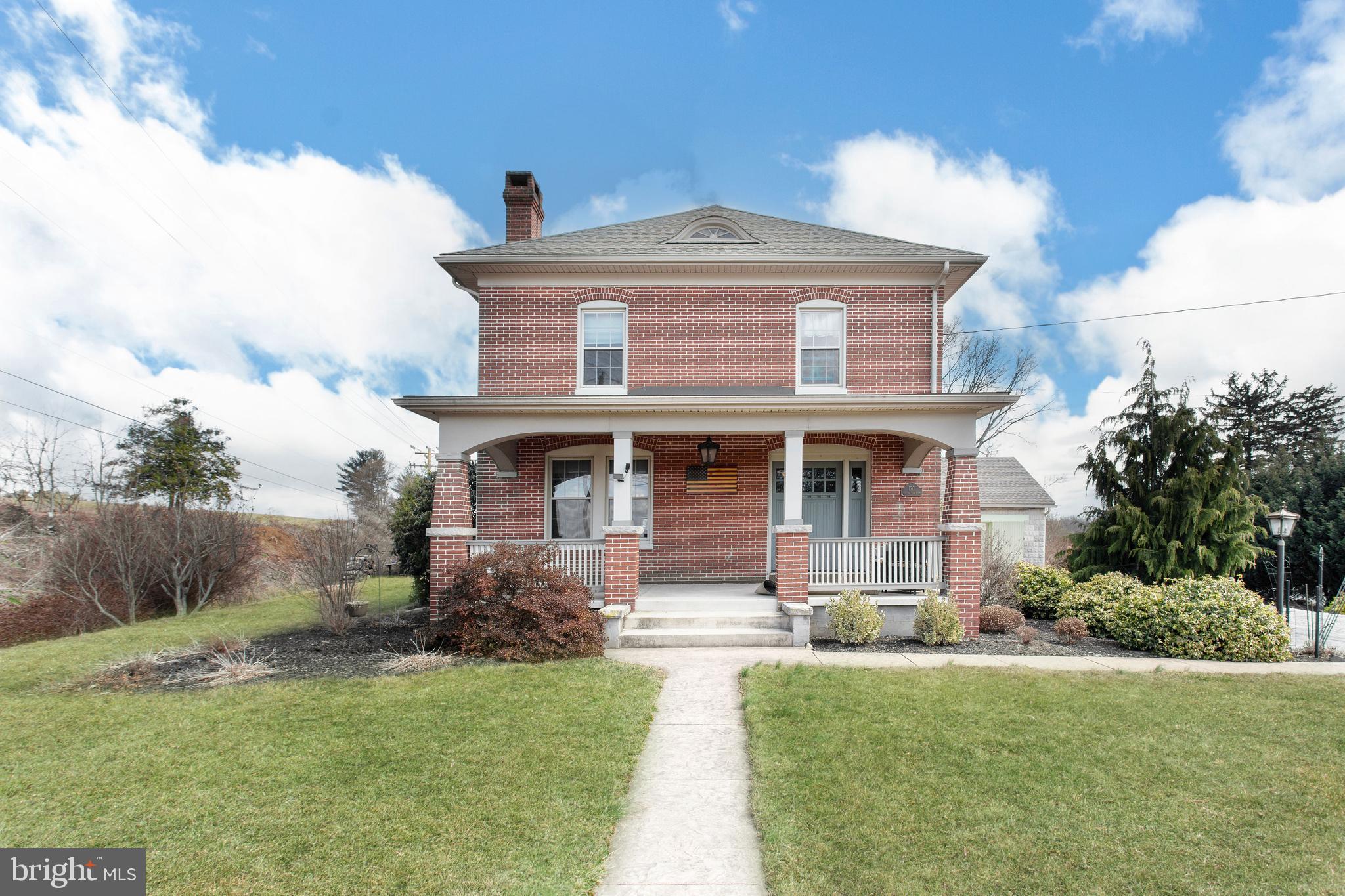 1501 Jacobs Mill Road Hanover, PA 17331 - Photo 2 of 39 a front view of a house with garden