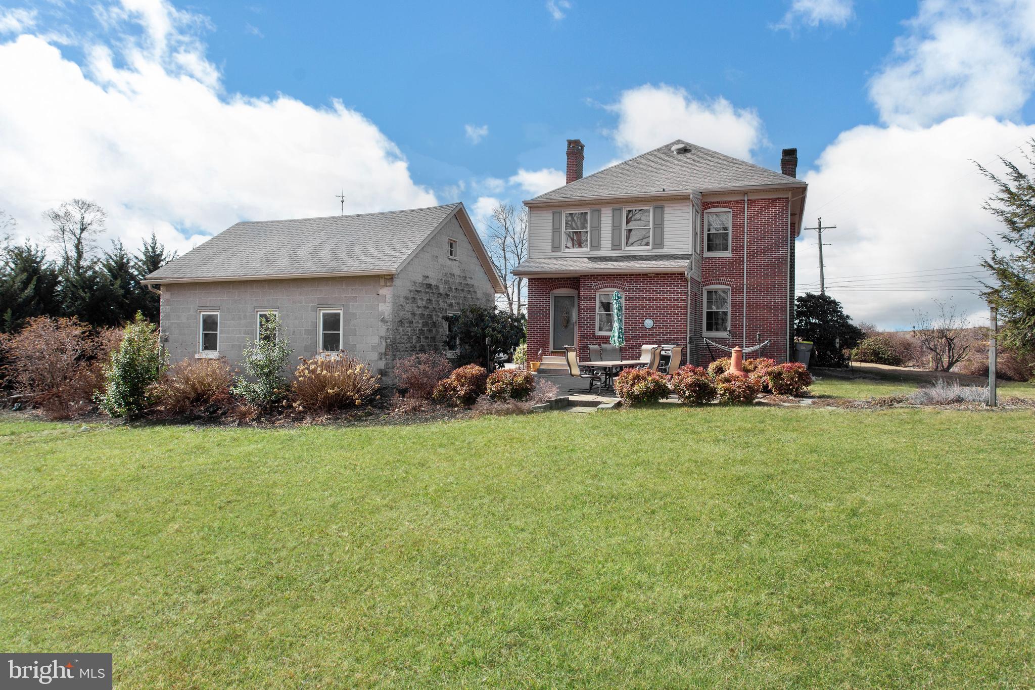 1501 Jacobs Mill Road Hanover, PA 17331 - Photo 4 of 39 a view of a house with a garden and yard