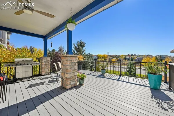 a view of a balcony with wooden floor