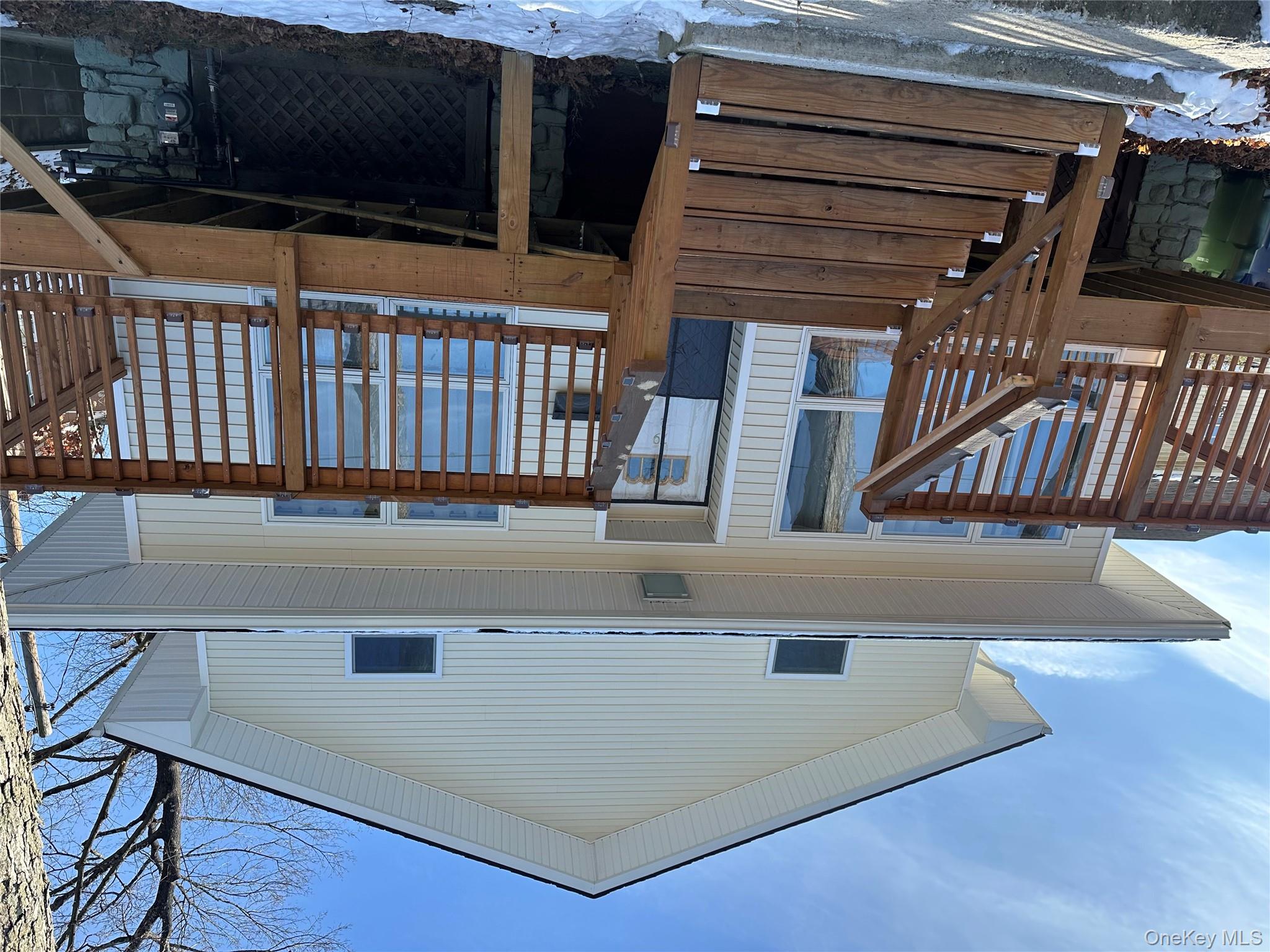 a view of entryway with a front door