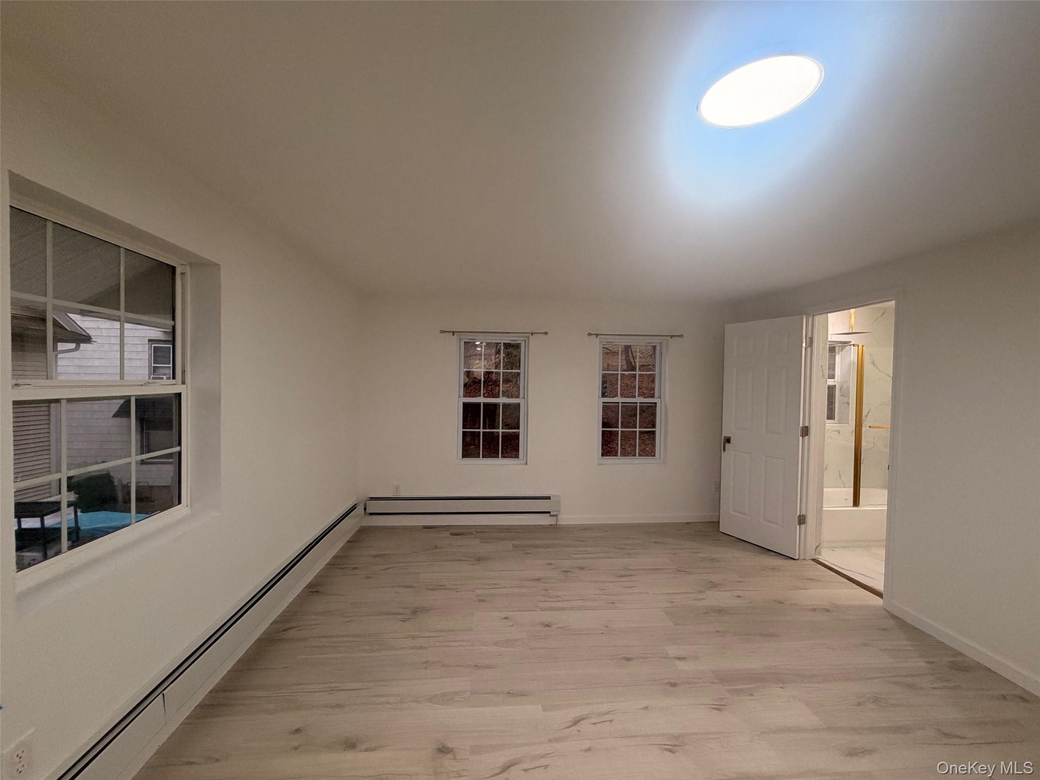 79 Monhagen Avenue Middletown, NY 10940 - Photo 12 of 22 an empty room with windows