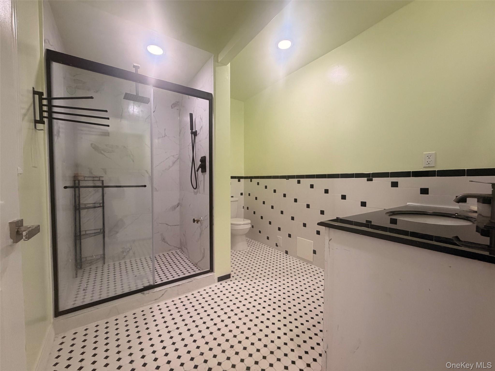 79 Monhagen Avenue Middletown, NY 10940 - Photo 9 of 22 a bathroom with a shower