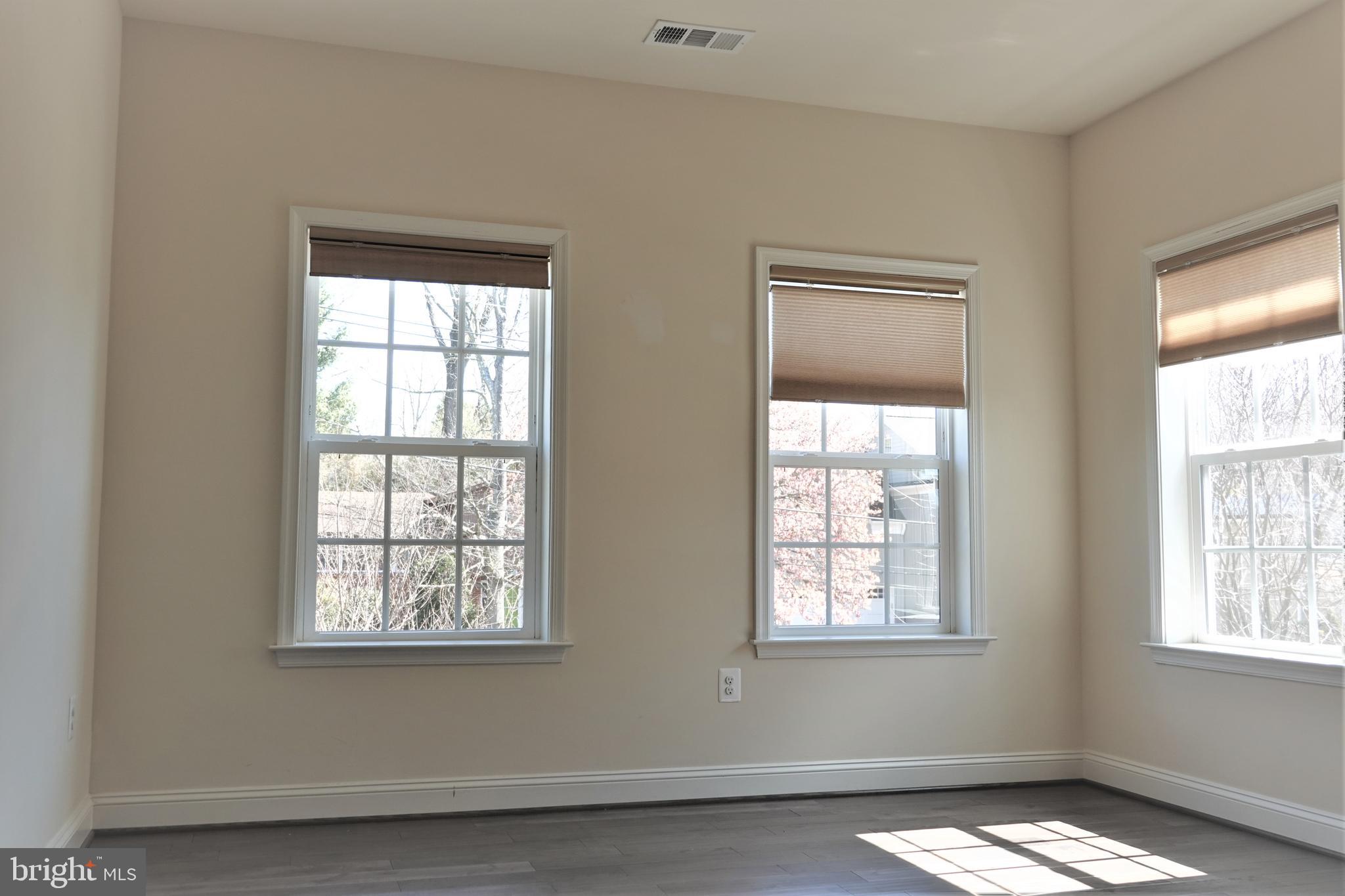 6606 Pyle Road Bethesda, MD 20817 - Photo 17 of 29 a view of an empty room with a window
