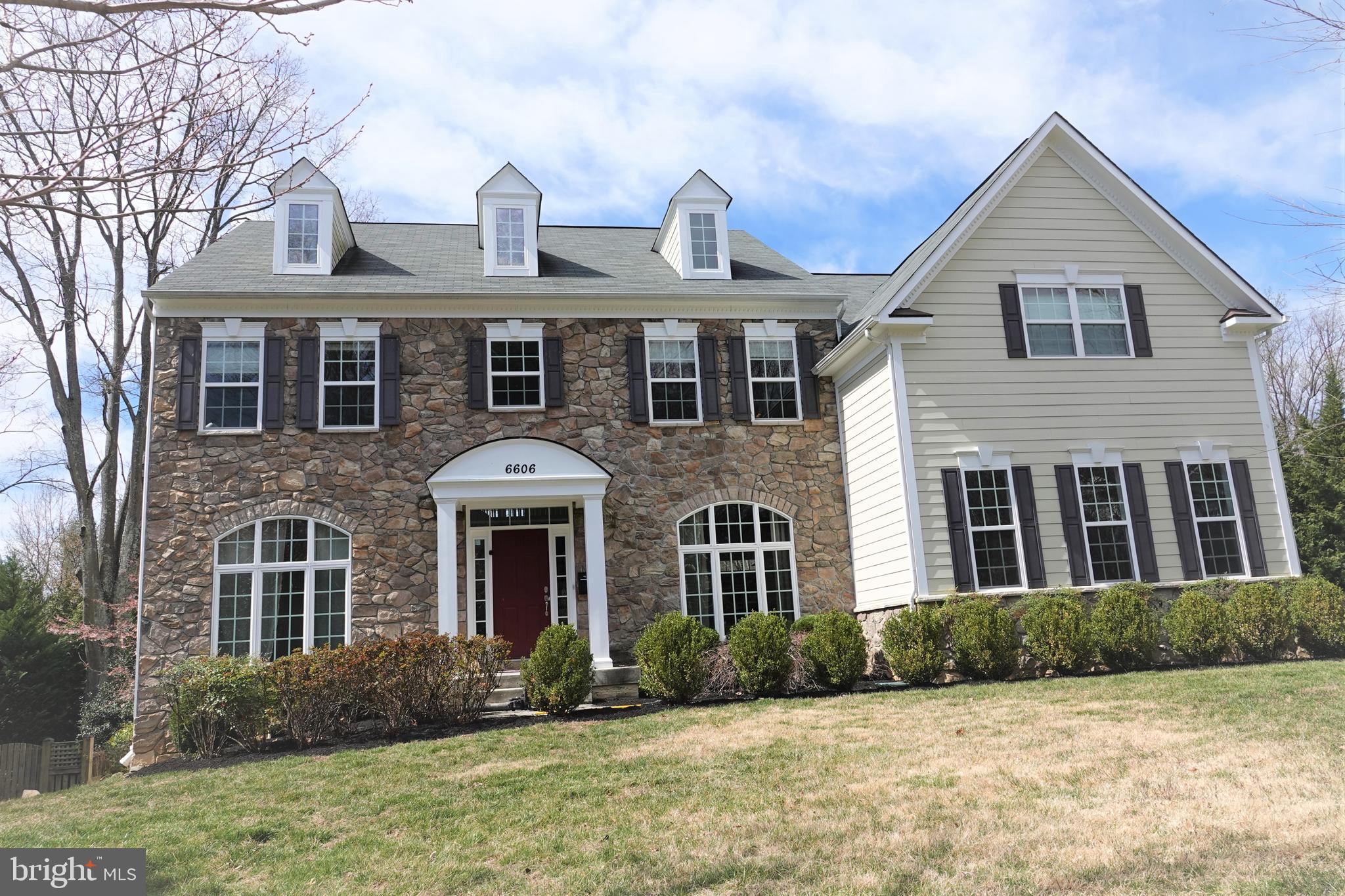 6606 Pyle Road Bethesda, MD 20817 - Photo 29 of 29 a front view of a house with garden