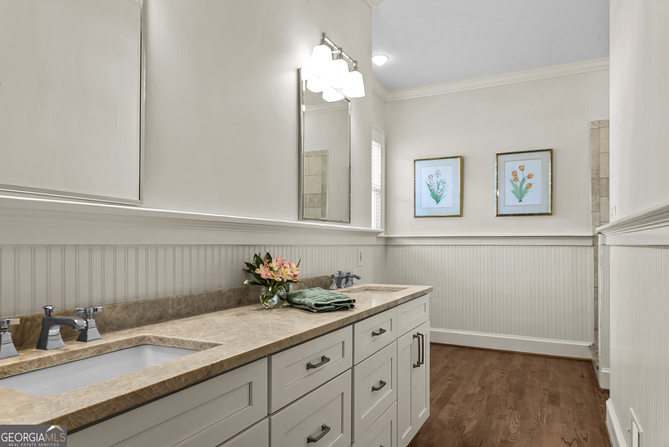 568 New Post Road Madison, GA 30650 - Photo 27 of 58 a bathroom with a sink and a mirror