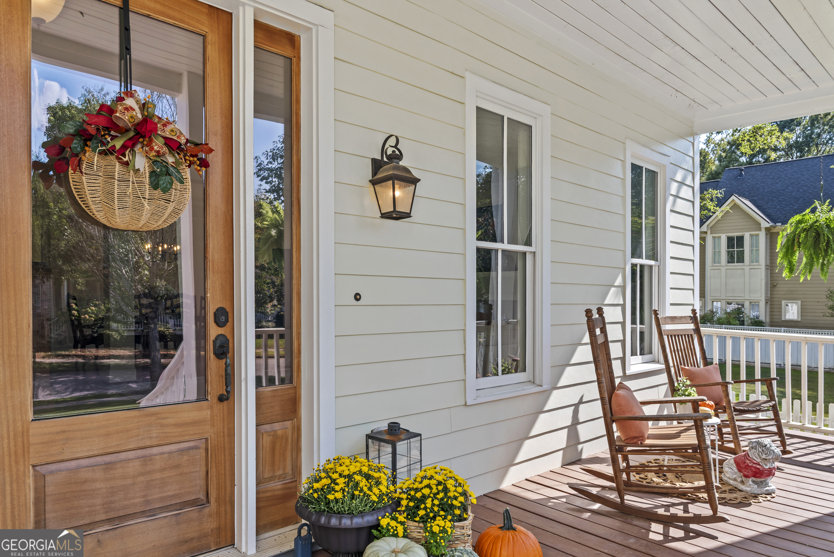 568 New Post Road Madison, GA 30650 - Photo 3 of 58 a view of a chairs and table in a balcony
