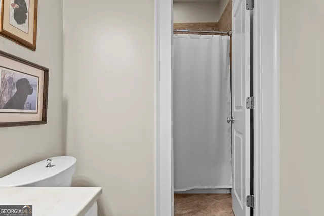 a bathroom with sink and a mirror