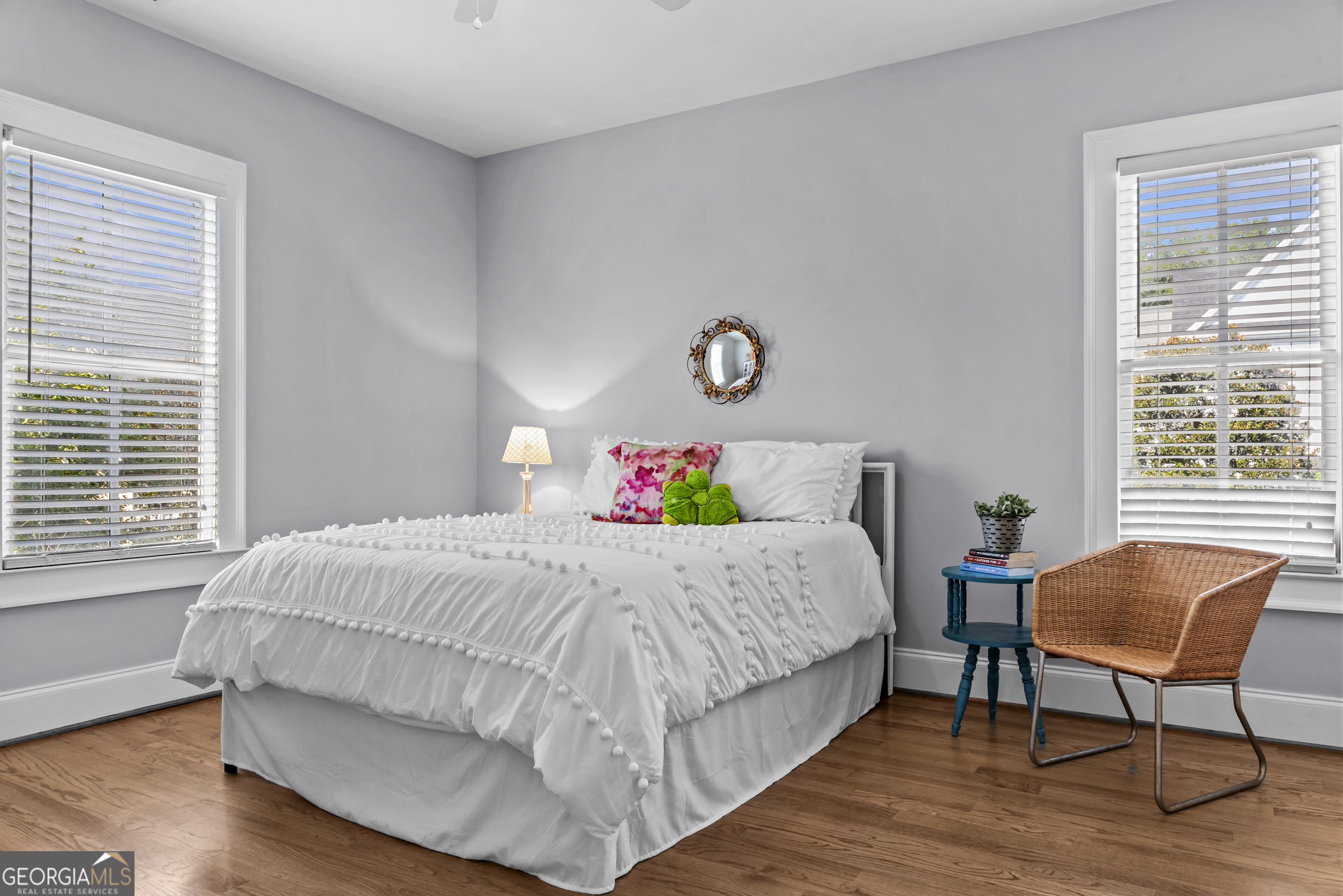 568 New Post Road Madison, GA 30650 - Photo 33 of 58 a bedroom with a bed and a window