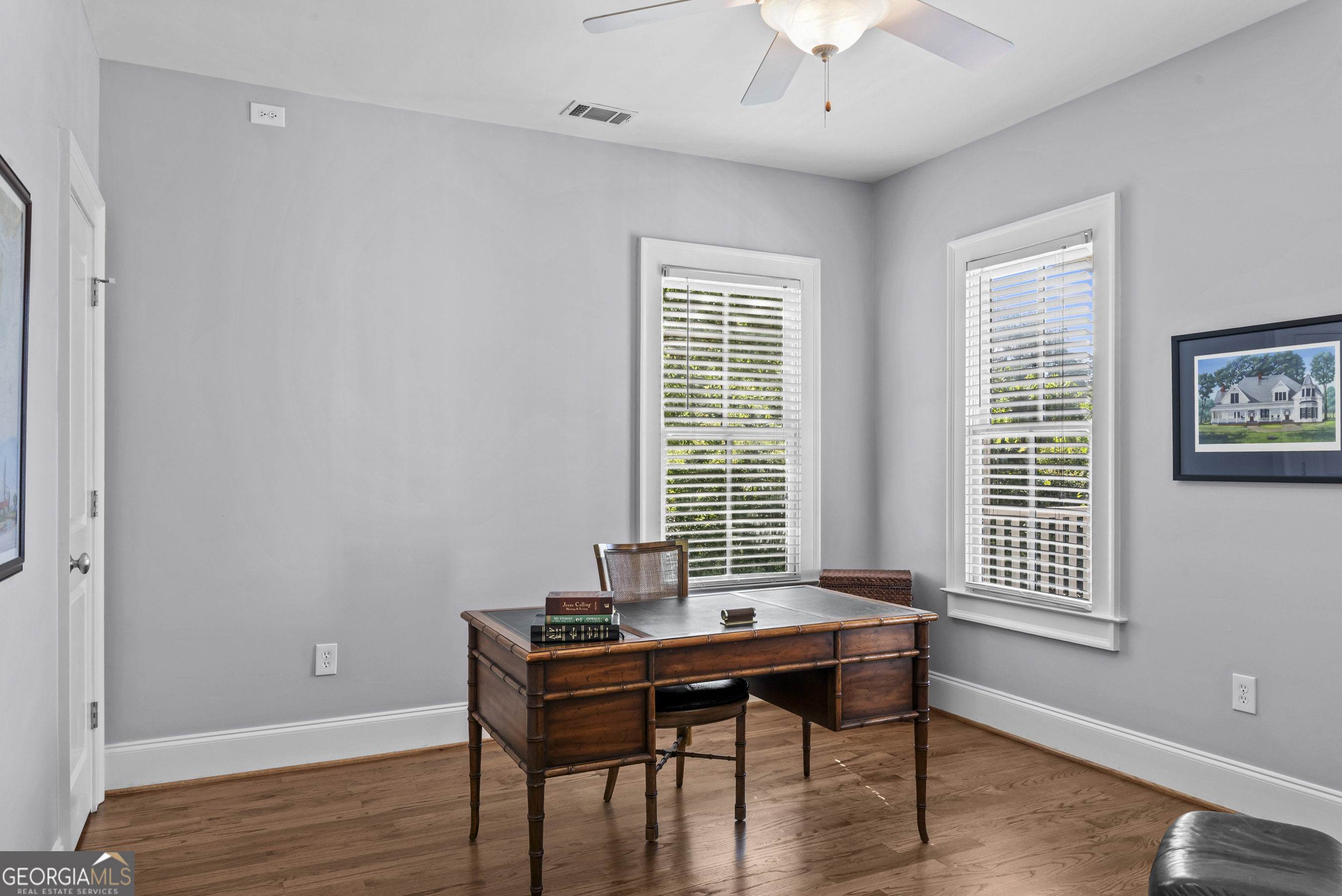 568 New Post Road Madison, GA 30650 - Photo 37 of 58 a view of a workspace with furniture and a window