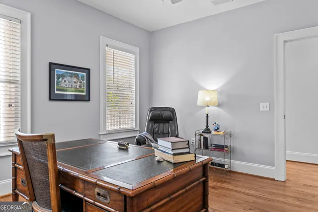 a view of a balcony with wooden floor