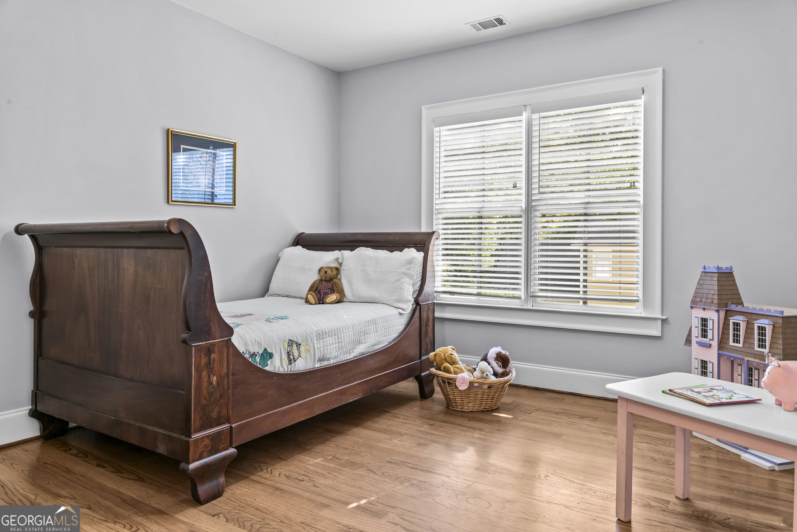 568 New Post Road Madison, GA 30650 - Photo 40 of 58 a bed room with a bed and a window