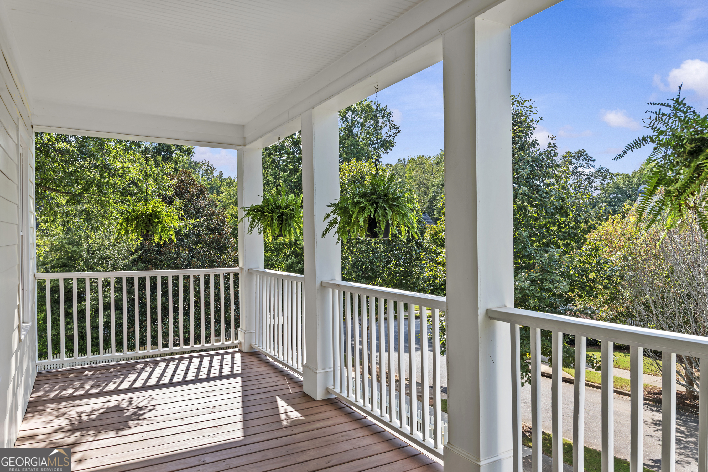 568 New Post Road Madison, GA 30650 - Photo 43 of 58 a view of a balcony with wooden floor