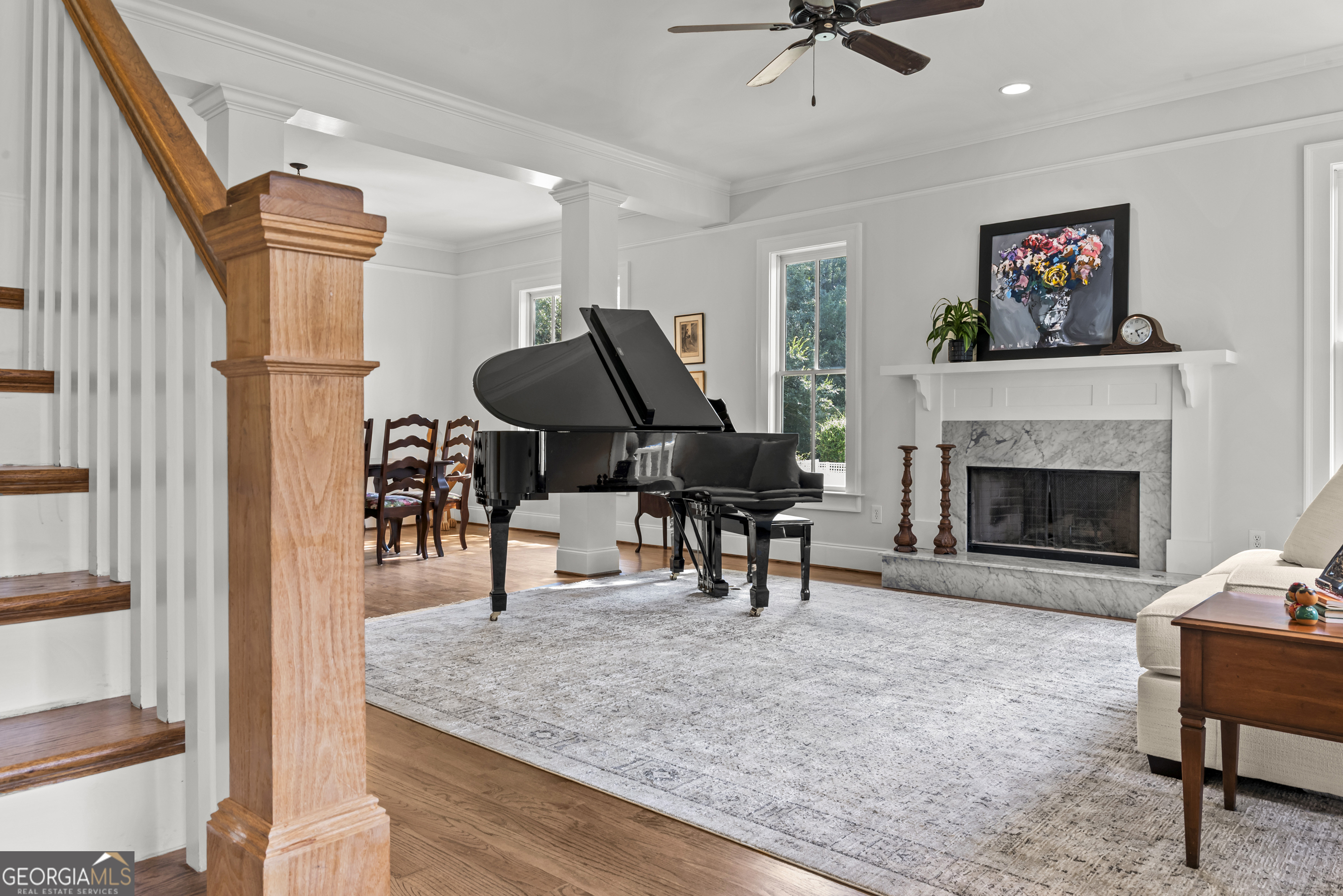 568 New Post Road Madison, GA 30650 - Photo 5 of 58 a living room with furniture a fireplace and a table