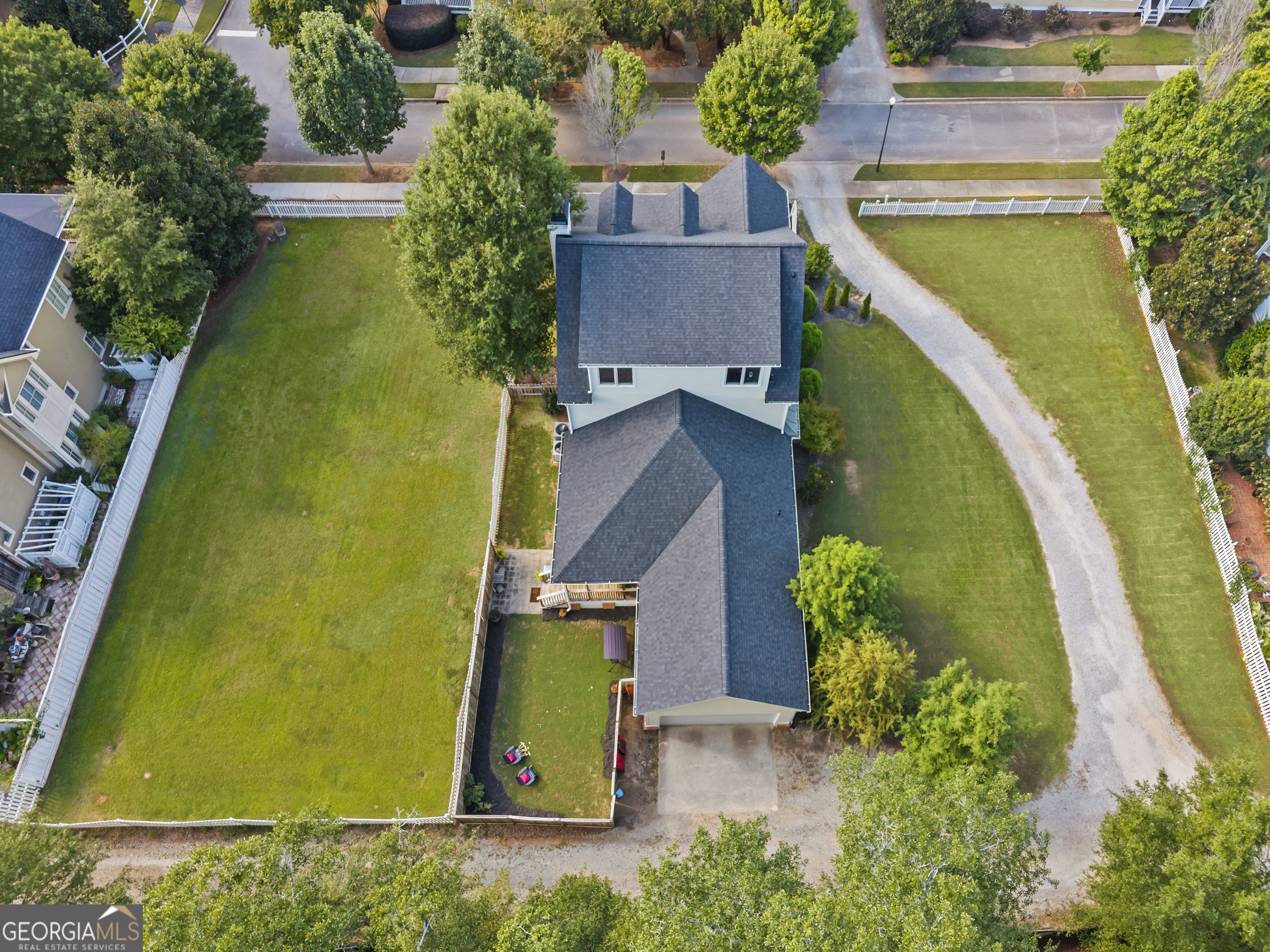 568 New Post Road Madison, GA 30650 - Photo 55 of 58 an aerial view of a house with swimming pool
