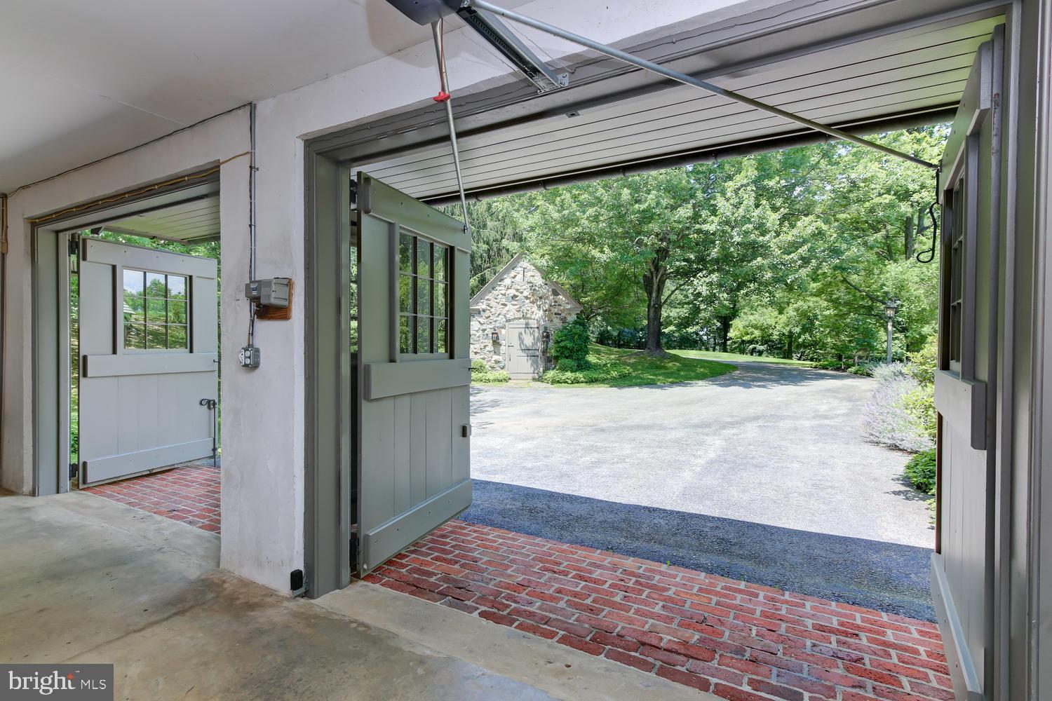 250 Fairview Road Coatesville, PA 19320 - Photo 26 of 50 Heated garage out to stone potting shed