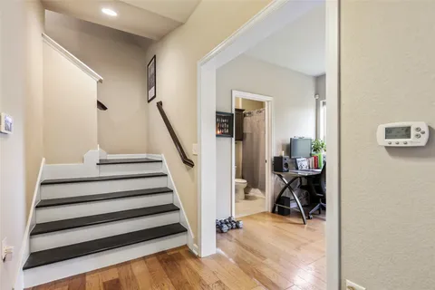 a view of a hallway with staircase