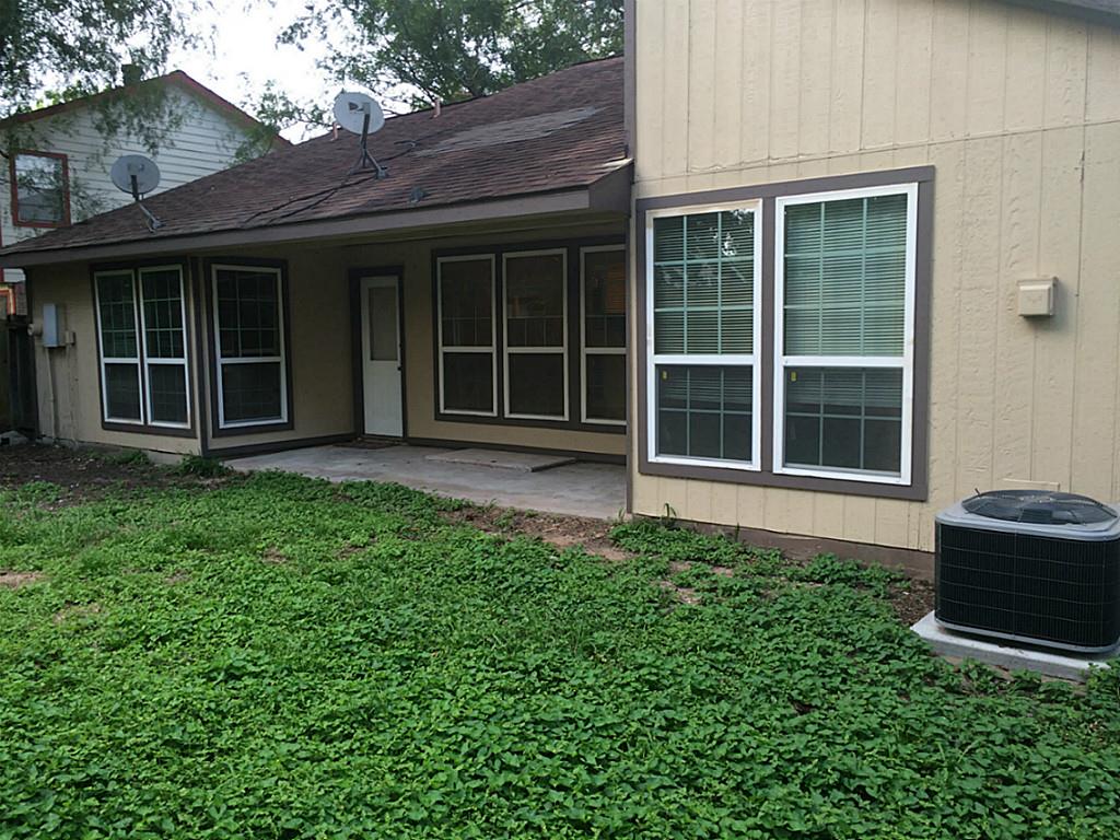 16826 Rippling Mill Drive Sugar Land, TX 77498 - Photo 18 of 18 a view of front a house with a large window