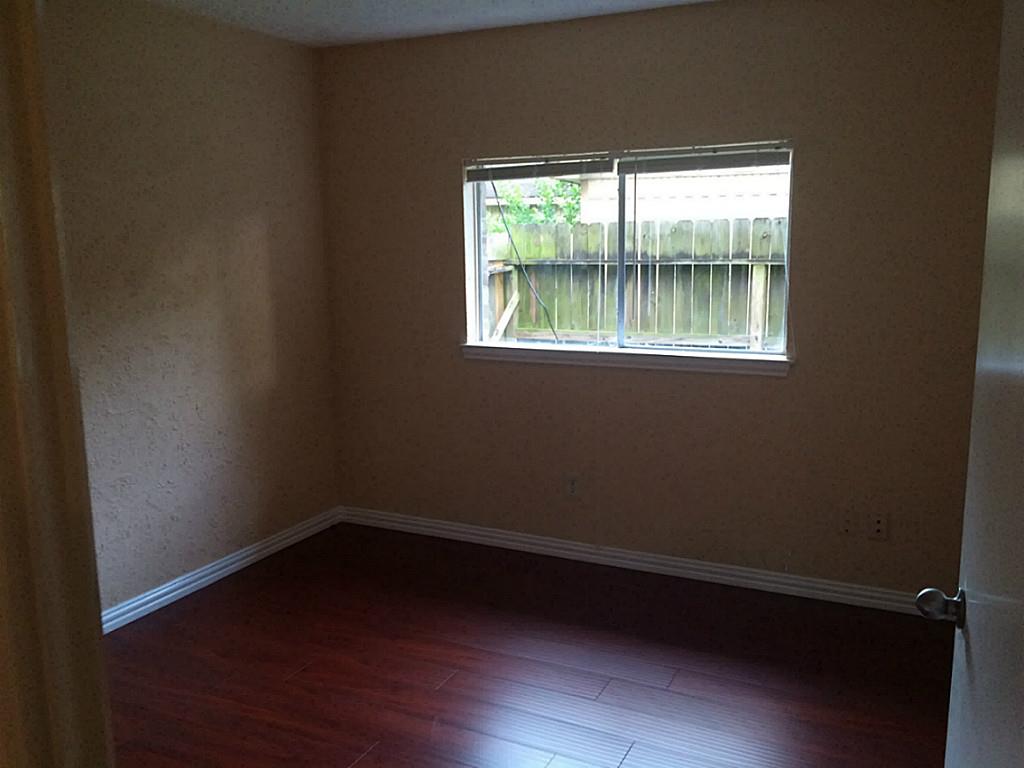 16826 Rippling Mill Drive Sugar Land, TX 77498 - Photo 7 of 18 a small space with wooden floor and a window