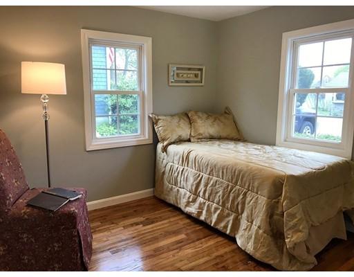 68 Leland Road Marshfield, MA 02050 - Photo 19 of 28 a bedroom with a bed and a window