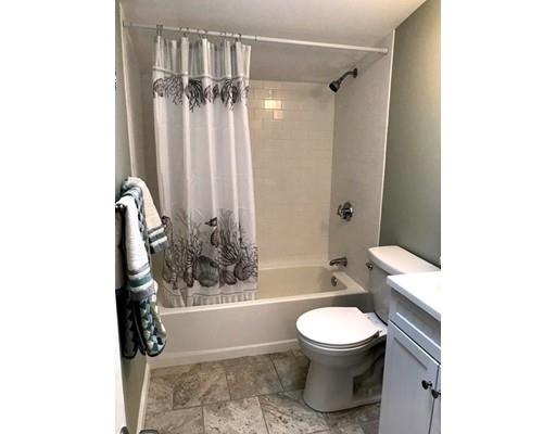 68 Leland Road Marshfield, MA 02050 - Photo 20 of 28 a bathroom with a toilet and a shower