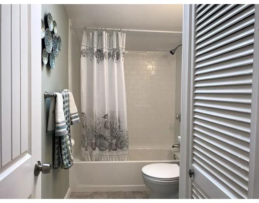 68 Leland Road Marshfield, MA 02050 - Photo 21 of 28 a bathroom with a toilet and a shower